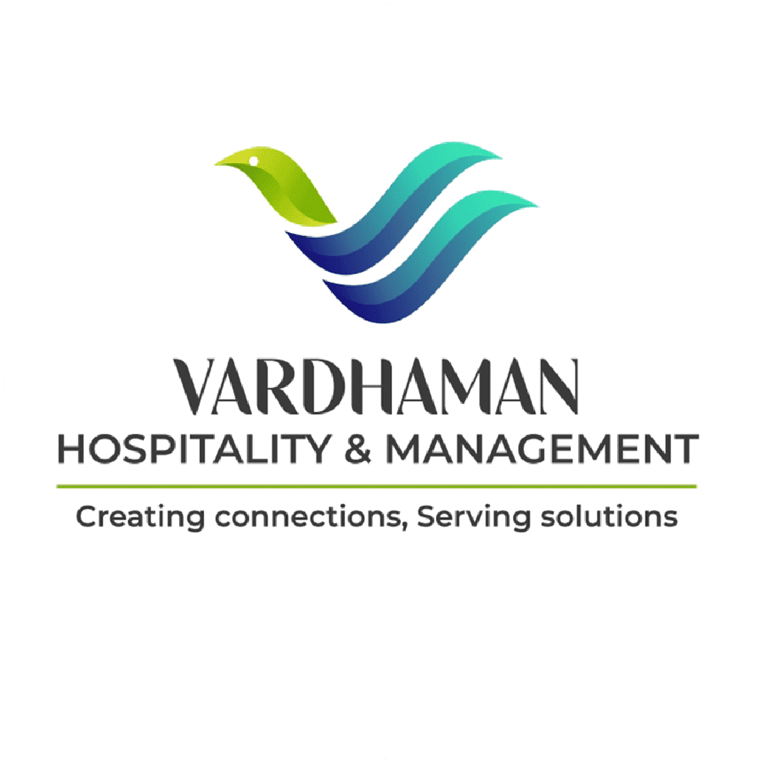 Company logo for Vardhaman Hospitality & Management on a white background, featuring a stylized green and blue bird icon in flight above elegant dark text and the tagline "Creating connections, Serving solutions".